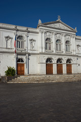 White classical style theatre in Plaza Arturo Prat in the old quarter of Iquique on the Pacific coast of northern Chile.