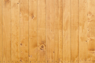 Naklejka premium Yellow background wooden texture for design