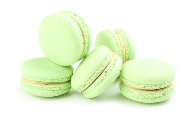 Tasty green macarons isolated on white