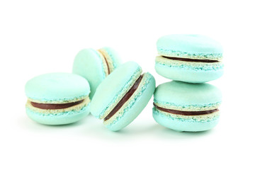 Fototapeta na wymiar Tasty blue macarons isolated on white