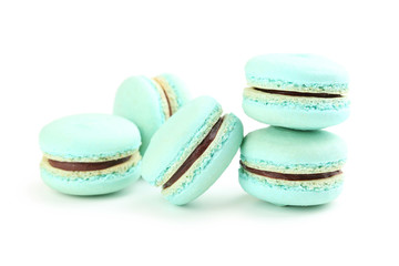 Tasty blue macarons isolated on white