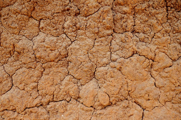 texture of a mud hut wall