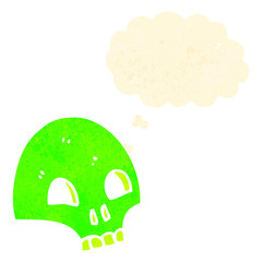 retro cartoon glowing green skull with thought bubble