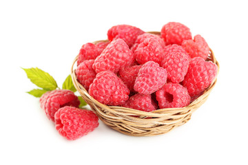 Red raspberry in basket isolated on a white