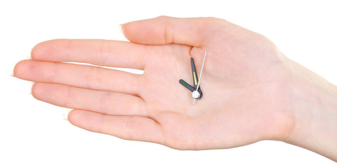 Hand holding clock arrows isolated on white