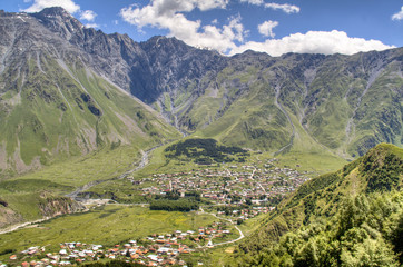 Fototapeta premium View over the village of Kazbegi (Stepantsminda), Georgia 