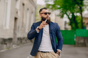 bearded man with e-cigarette