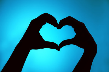 Silhouette of hands close up