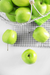 Green apples on windowsill, closeup