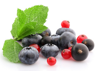 Mix of fresh berries isolated on white isolated on white