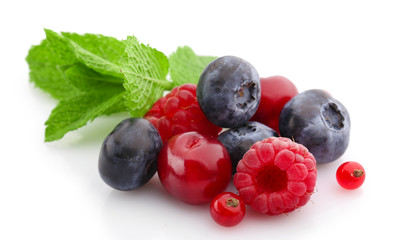 Mix of fresh berries isolated on white isolated on white