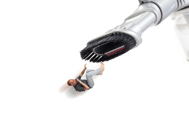 Man being sucked by a vacuum cleaner