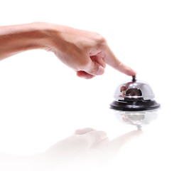 Hand ringing in service bell isolated on white