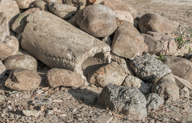 image of Old and cracked concrete pipe for watering.