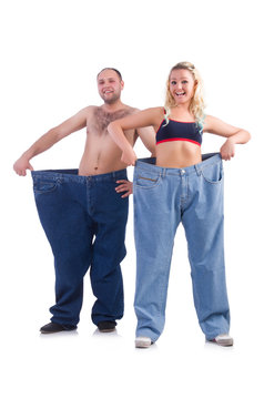 Woman and man loosing weight isolated on white