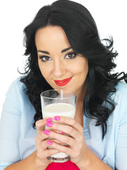 Young Woman Drinking a Glass of Milk
