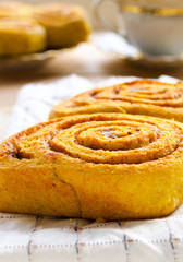 Pumpkin cinnamon rolls with spices and sweet cream