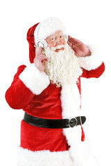 Santa Claus with headphones listening to music, isolated on white background