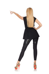 Pretty woman in tight black pants isolated on white