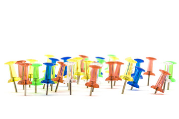 Army of colorful, lonely stationery pins