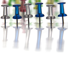 Lot of push pins with reflections