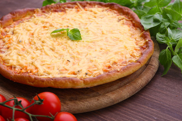 Cheese pizza with cherry tomatoes on table close up