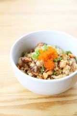 Japanese Salmon fried rice on wood background