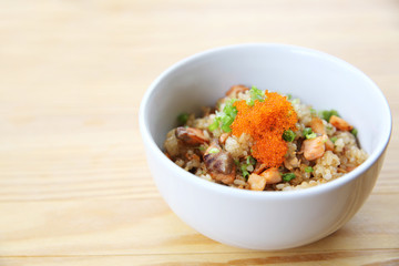 Japanese Salmon fried rice on wood background