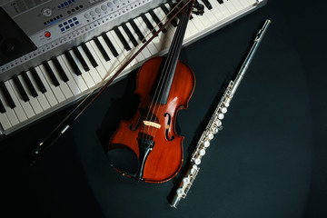 Fototapeta premium Musical instruments on dark background