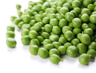 Heap of fresh green peas isolated on white