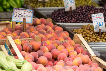 Fruit market with various colorful fresh fruits and vegetables