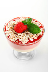 Dessert with fresh strawberry, cream and granola, isolated on white