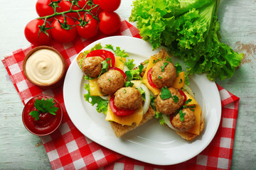 Meatball Sandwiches on wooden table background