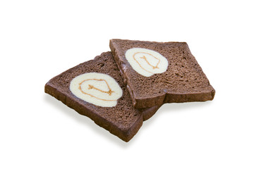 sliced chocolate bread with jam roll cakes