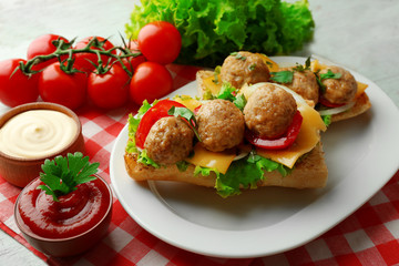Meatball Sandwiches on wooden table background