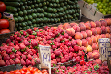 Fruit market with various colorful fresh fruits and vegetables