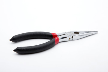 pliers red and black color to work on white background