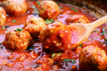 Pan with meat balls in tomato sauce, close-up
