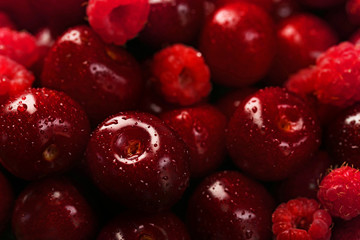 Sweet cherries and raspberries, close-up