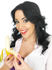 Young Woman Eating a Banana