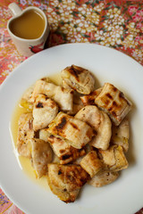 Grilled banana serve with syrup.