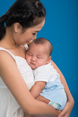 Woman with sleeping baby