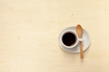 Hot coffee with space on wood background
