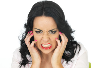 Portrait of an Angry Frustrated Young Hispanic Woman Clenching Her Teeth
