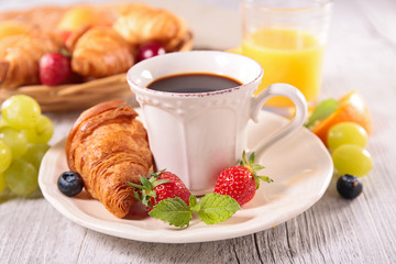 coffee cup and croissant