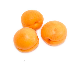 Three ripe apricot closeup