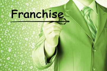 business man writing franchise