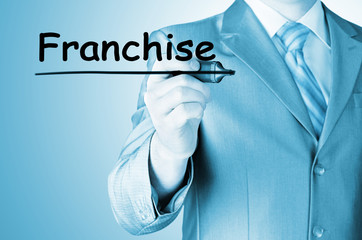 business man writing franchise