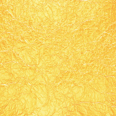 Shiny yellow leaf gold foil texture for background