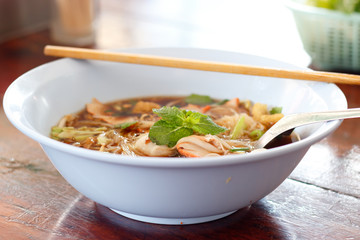 hot bowl of noodles in cafeteria.